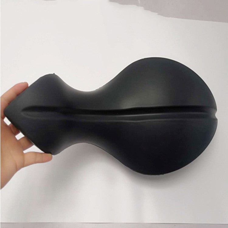 Curved dolphin-shaped Pilates spine corrector for stretching, core and mobility exercises, available in black and pink and in XS, S and M sizes.