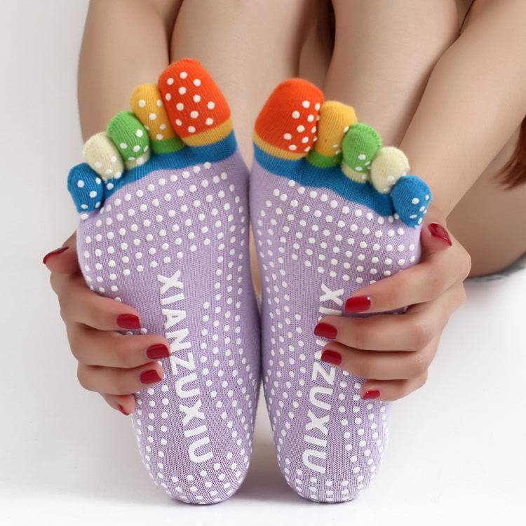 Short five-toe yoga and Pilates socks with contrasting toe sections, printed details and non-slip grip soles in multiple colours.