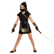 Girl wearing a black hooded ninja dress with gold trim, a black face mask, and matching arm accessories while holding a toy sword.
