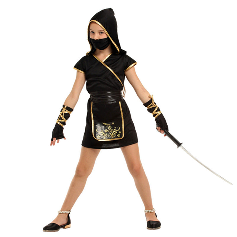 Girl wearing a black hooded ninja dress with gold trim, a black face mask, and matching arm accessories while holding a toy sword.