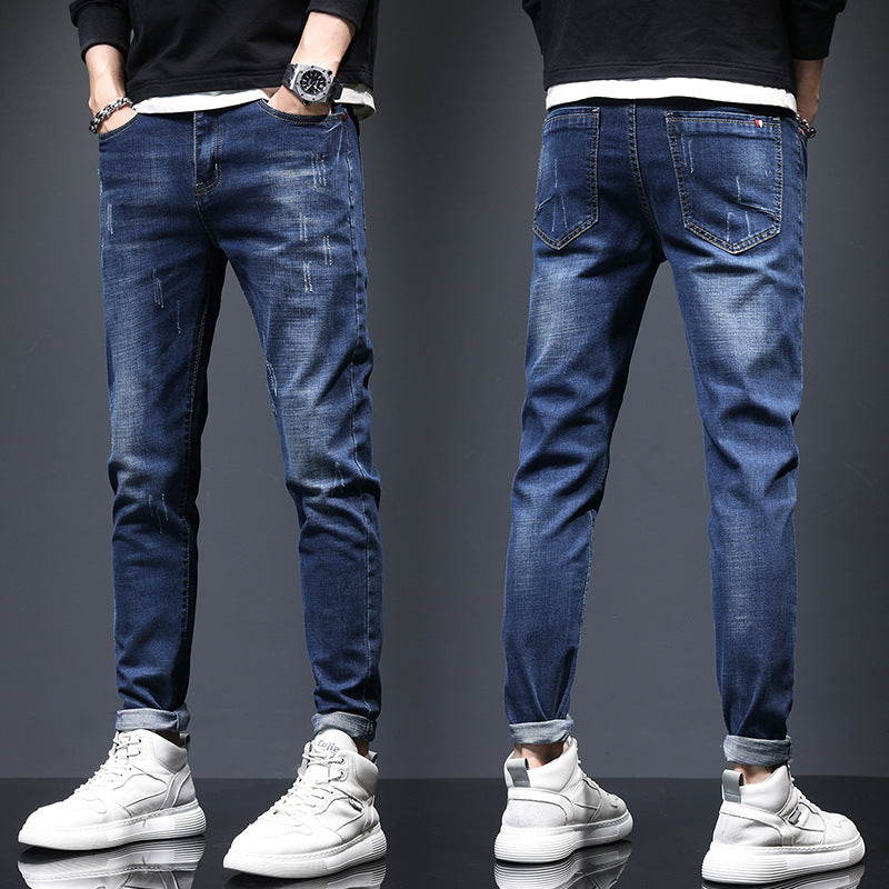 Men’s ripped straight-leg denim jeans with cat-whisker fading, a mid-rise waist and medium-stretch cotton-blend fabric, available in black and blue.