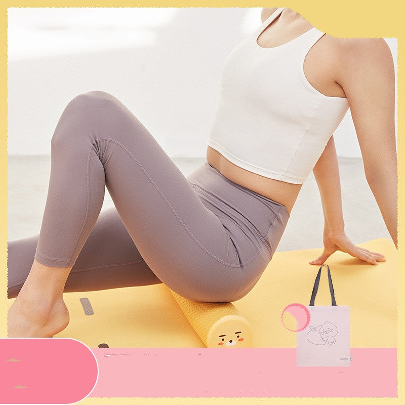 Orange Ryan character foam roller measuring 45 × 9.5 cm or 17.7 × 3.7 inches for stretching, mobility and post-workout self-massage.