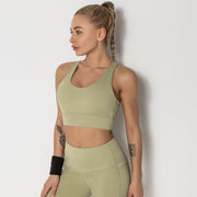 Women’s shockproof running sports vest designed for yoga, fitness, gym training, and activewear with a comfortable solid-color fit.