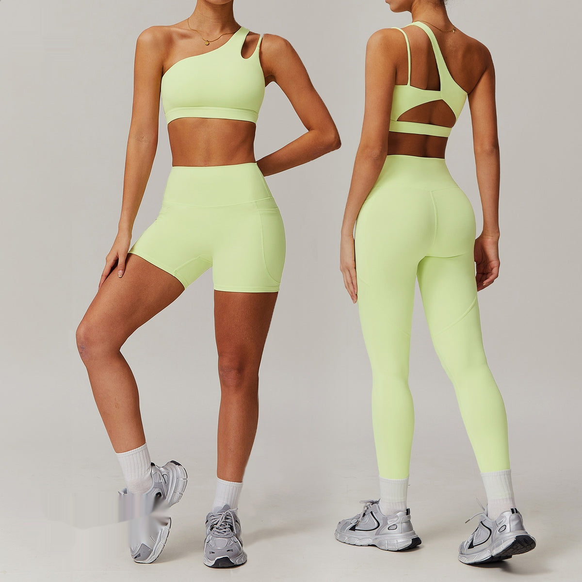 Women’s fitted quick-dry yoga set with a one-shoulder sleeveless top and matching full-length trousers, available in seven colours and sizes S to XL.