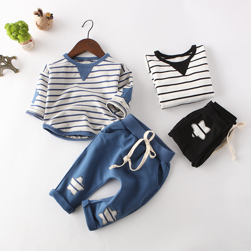 Cotton star embroidered baby outfit with a long-sleeve pullover top and full-length trousers in black or light blue.