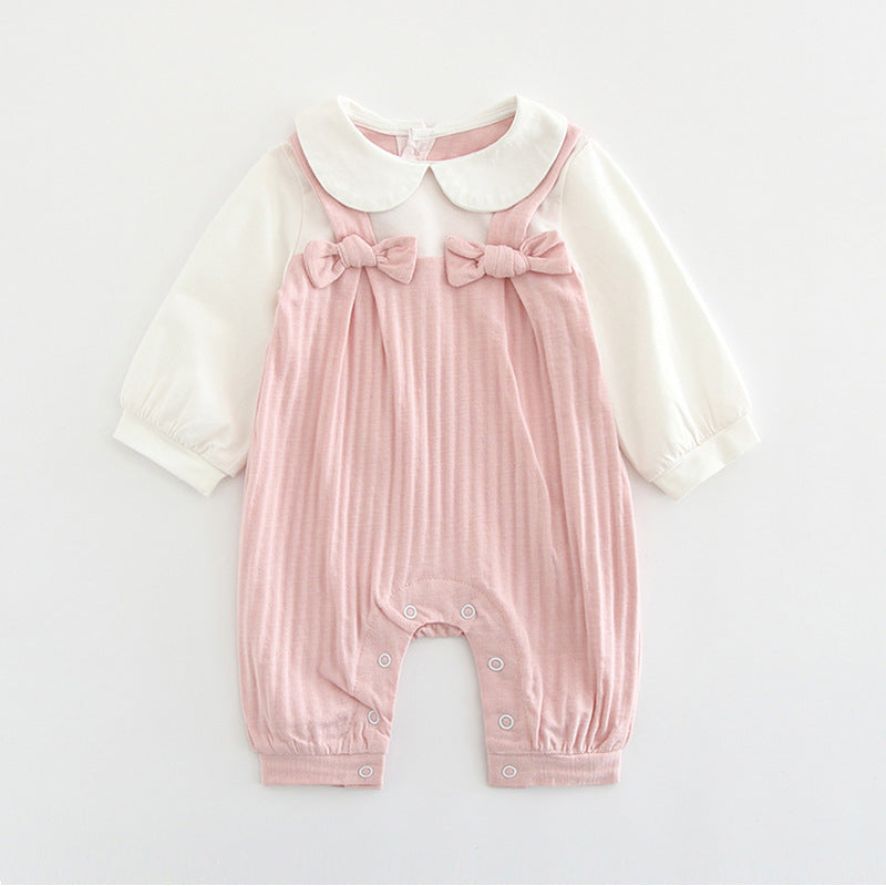 Pink 100% cotton embroidered baby girl jumpsuit with long sleeves and a single-breasted fastening.