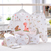 Five-piece newborn baby underwear set with long sleeves and cartoon styling, available in blue, pink, purple and yellow.