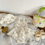 Sleeveless floral cotton baby girl romper with a matching hat, hidden-hook fastening and sizes from 66 to 90 cm.
