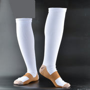 Knee-high compression-style nylon stockings available in black, white and skin-tone colours for everyday supportive wear