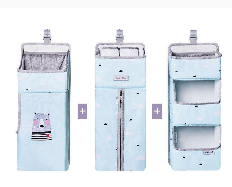 Large cotton and polyester hanging baby diaper organiser measuring approximately 66 × 50 × 13 cm.
