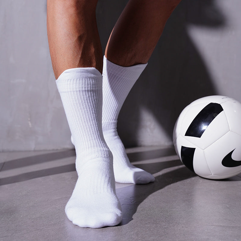 Men’s high-tube protective football and basketball socks with front padding, moisture-managing yarn and full terry cushioning
