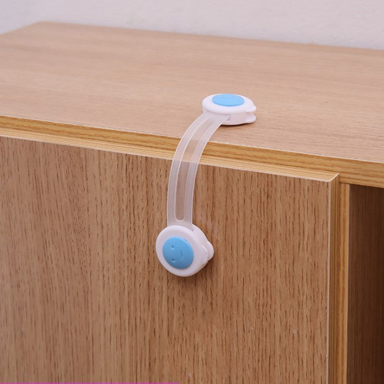 Multifunctional child safety lock for compatible drawers, cupboards, refrigerators and interior doors, available in blue, pink and white.