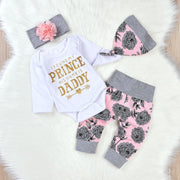 Pink letter-print baby outfit with long sleeves, matching trousers, a removable hat and coordinating headband.