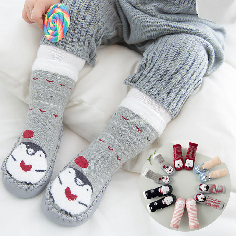 Plush terry non-slip baby and toddler floor socks for warm indoor winter wear, available in six assorted styles.