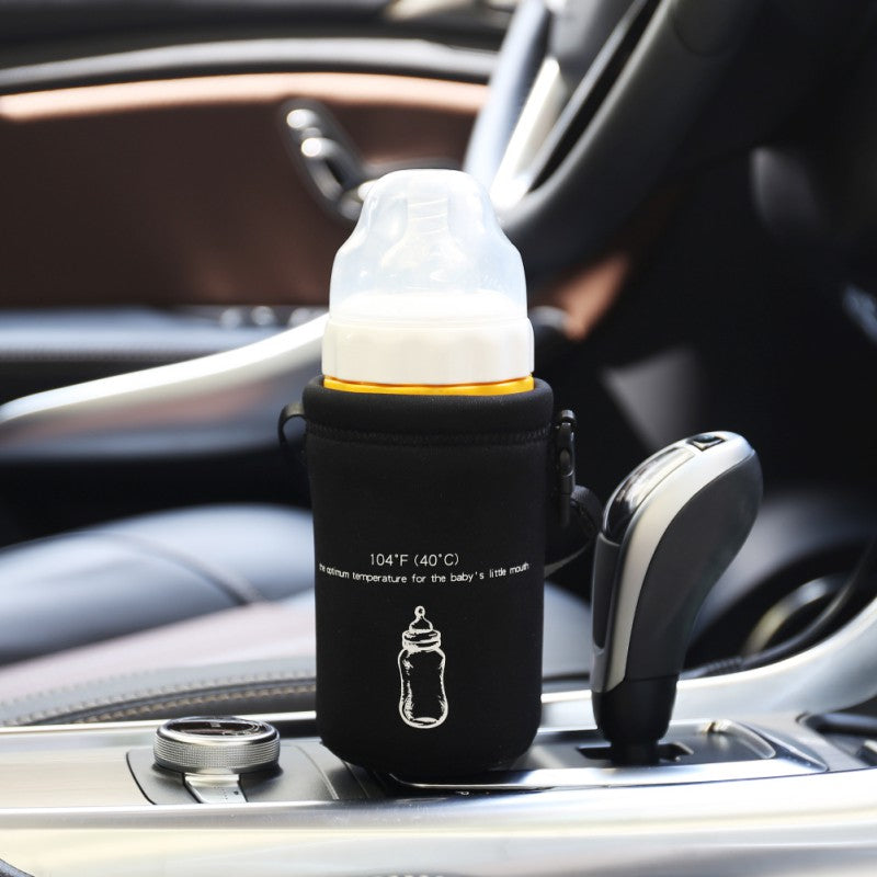Portable 10 W USB baby bottle warmer with an adjustable Velcro strap, carrying handle and 80 cm power cable.