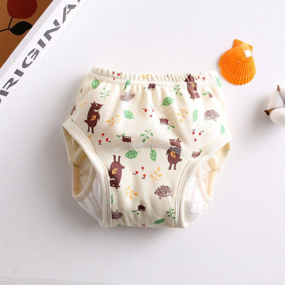 Reusable wing-style baby training pants with extended side coverage and colourful cartoon prints, available in sizes 80–120.