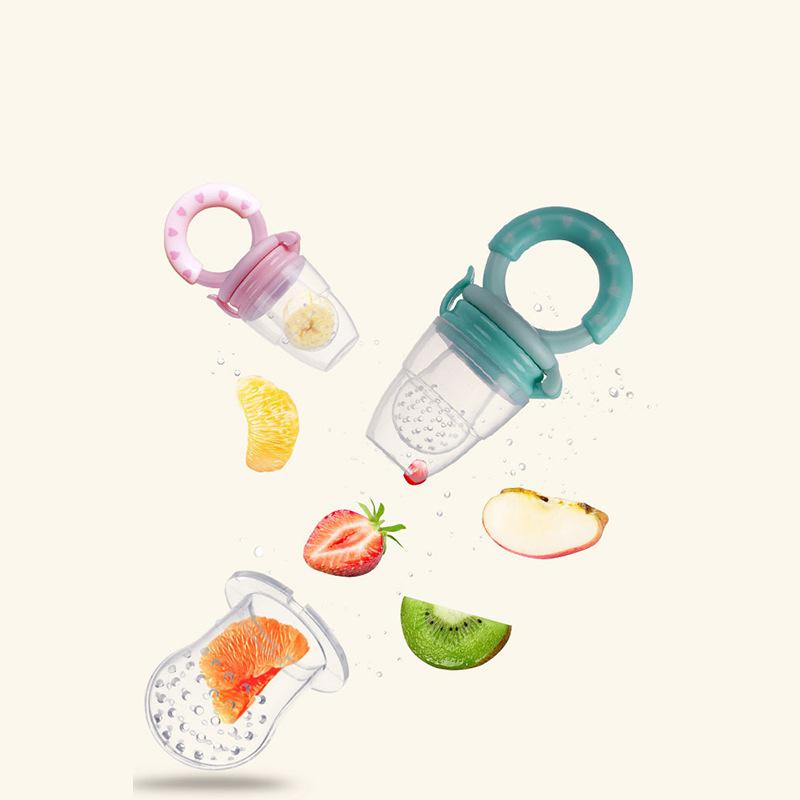 Silicone baby fruit and vegetable feeder pacifier with an easy-grip handle, available in blue and pink.
