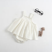 Sleeveless 95% cotton summer romper for baby girls, available in brown and white and sizes from 66 to 100 cm.