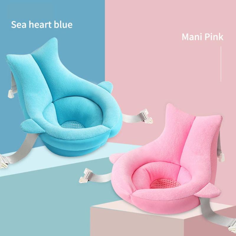 Suspended baby bath support mat with a towel-fabric surface and swim-fabric lining, available in blue and pink.