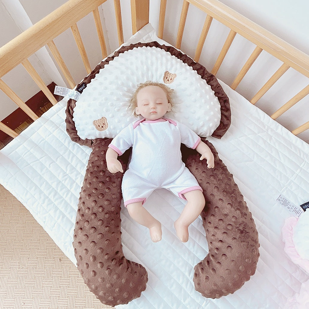 Rectangular velvet children’s pillow with pearl-cotton filling, available in embroidered animal and celestial designs.