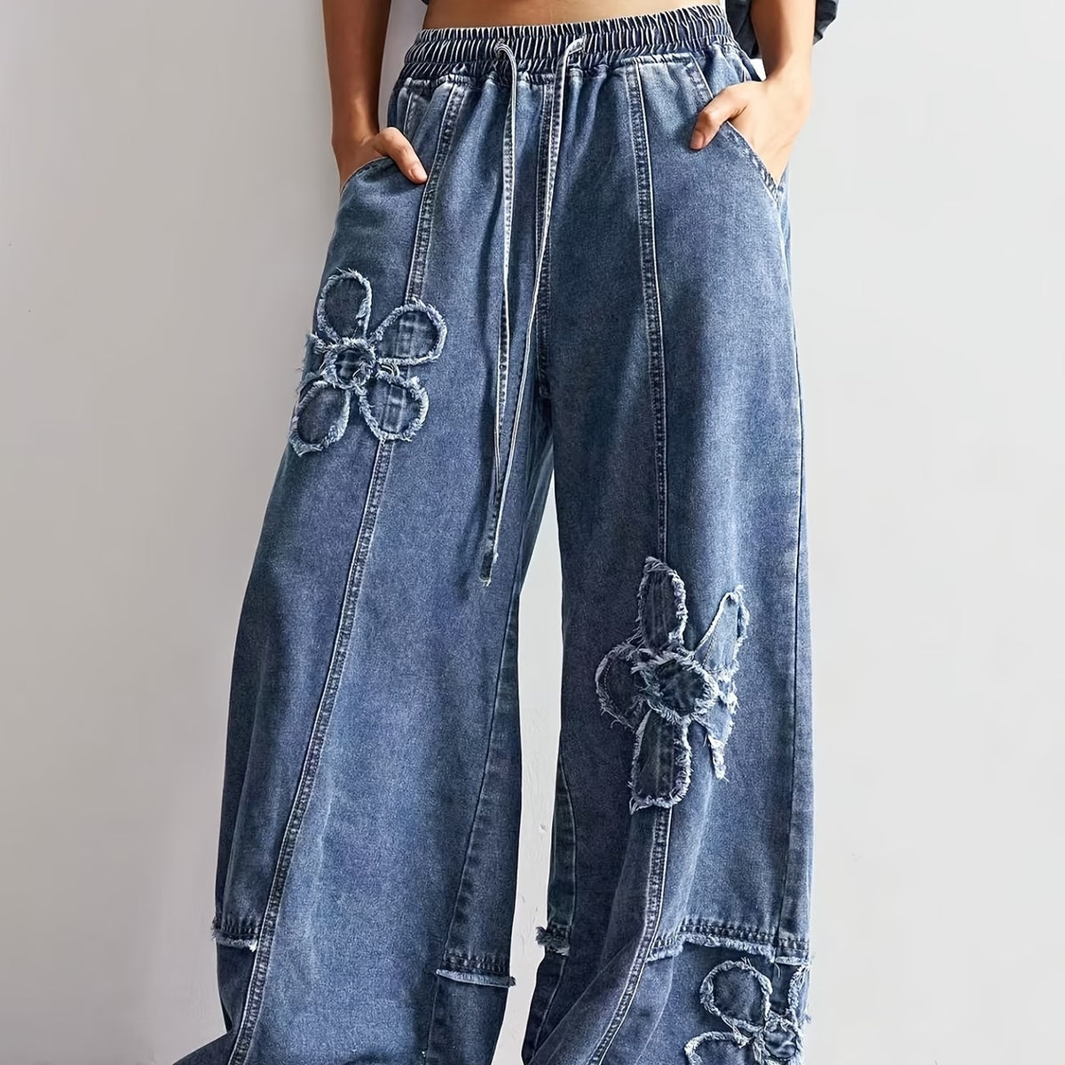 Women’s blue polyester jeans with a modern everyday design, available in sizes XS, S, M, L and XL