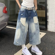 Women’s blue high-waisted cropped retro jeans with a trendy denim design and polyester main fabric composition