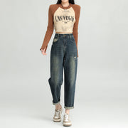 Women’s retro-blue high-waisted harem jeans with washed cotton denim, distressed holes and a relaxed fit