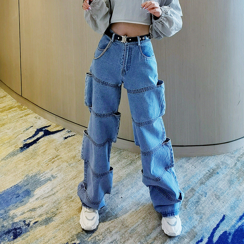 Women’s light blue distressed straight-leg jeans with a mid-rise waist, full-length silhouette and bold ripped streetwear detailing