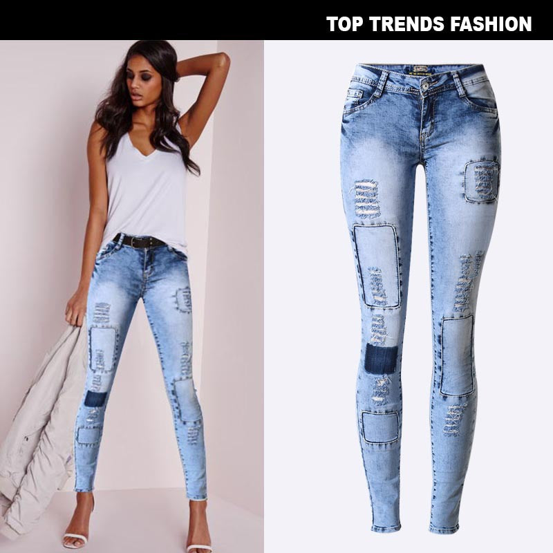 Women’s light blue low-rise skinny jeans with ripped holes, patchwork details, whitening, zips and a full-length pencil-leg silhouette