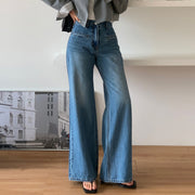 Women’s blue retro high-waisted wide-leg trousers made from textured chenille fabric with a full-length silhouette
