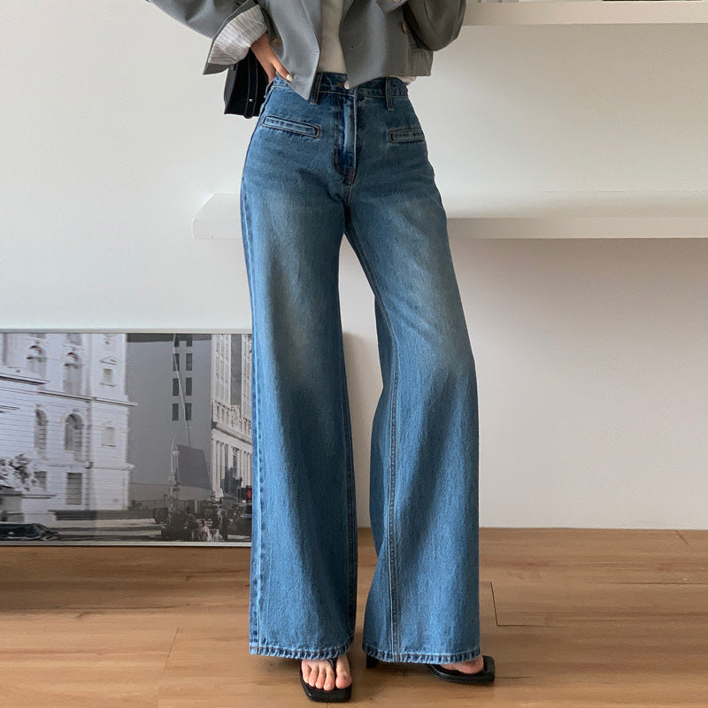 Women’s blue retro high-waisted wide-leg trousers made from textured chenille fabric with a full-length silhouette